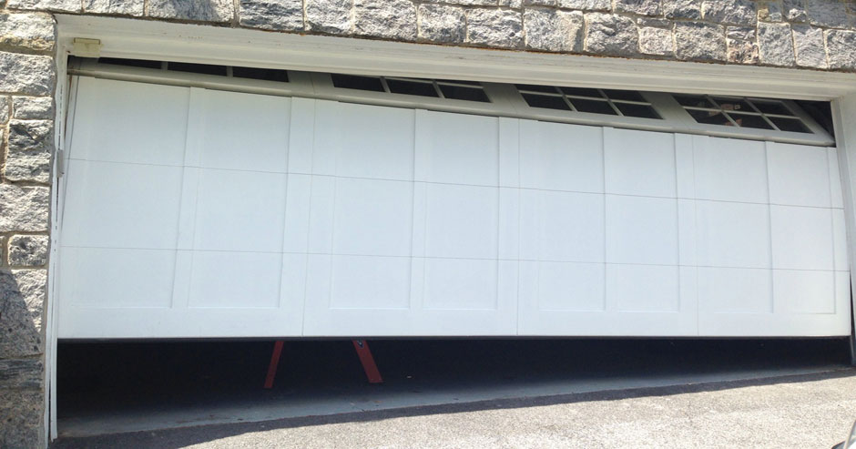 Broken garage door repairs  Puyallup